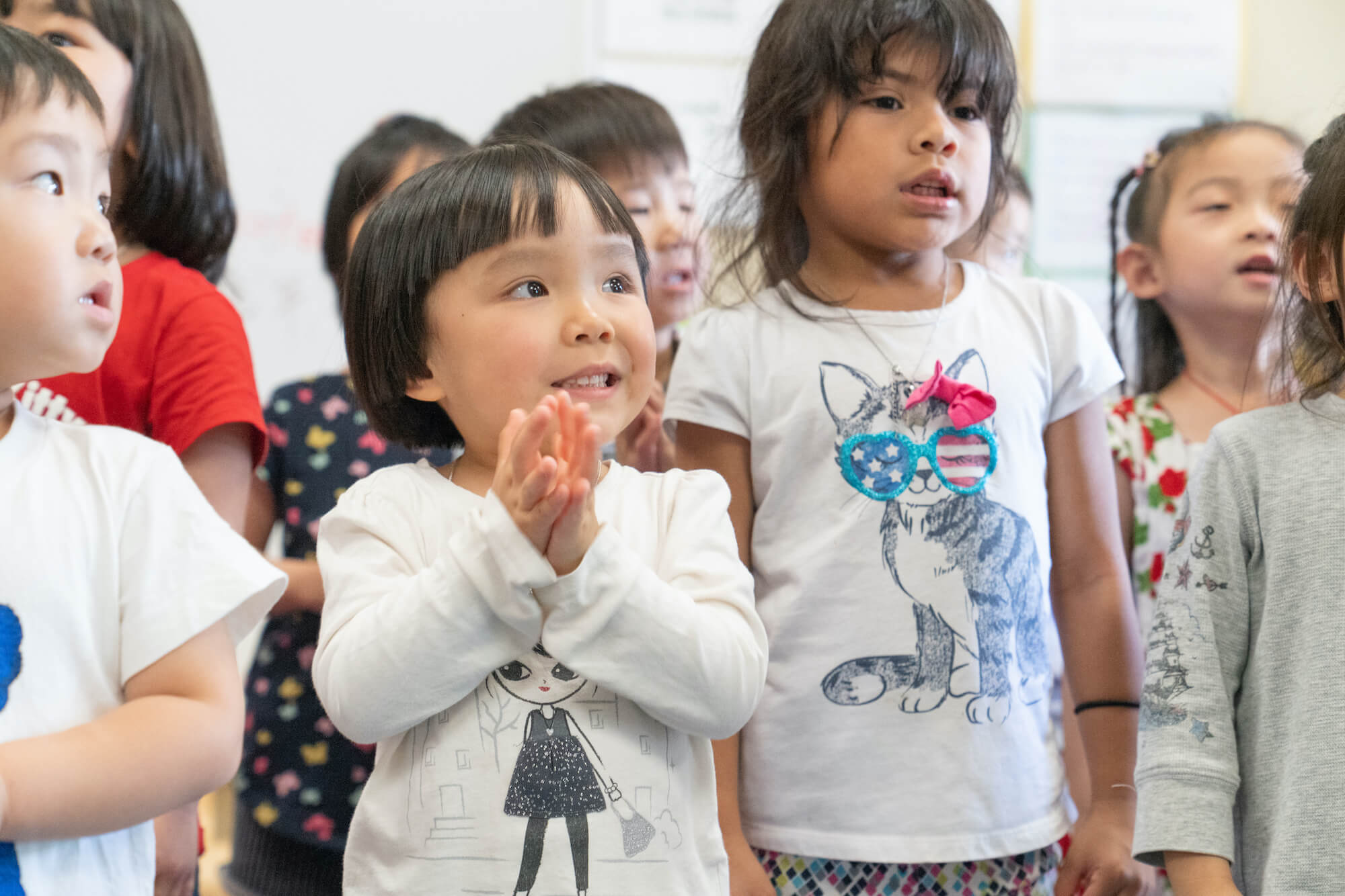 Preschool- boys-and girls-in=white-t-shirts